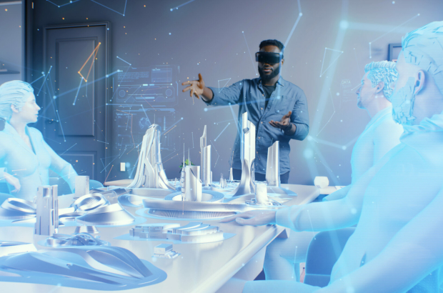 a-man-wearing-vr-glasses-in-the-cyberspace-of-the-meta-universe-at-an-online-meeting-discussing-a-holographic-3d-architectural-design-of-a-futuristic-sustainable-city-of-the-future-stockpack-istock.jpg