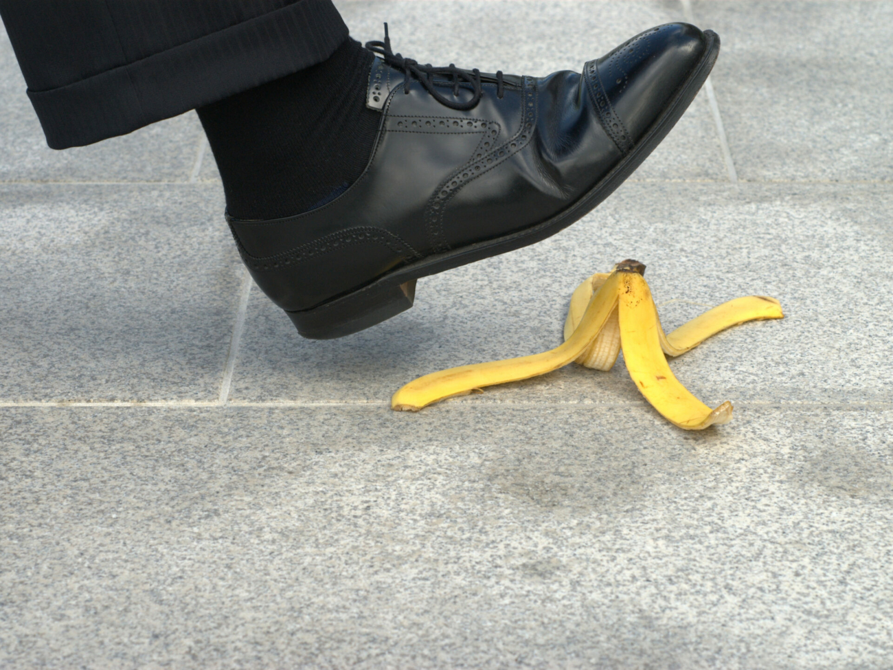 businessman-about-to-step-on-a-banana-skin-alternative-version-shown-below-stockpack-istock-1.jpg