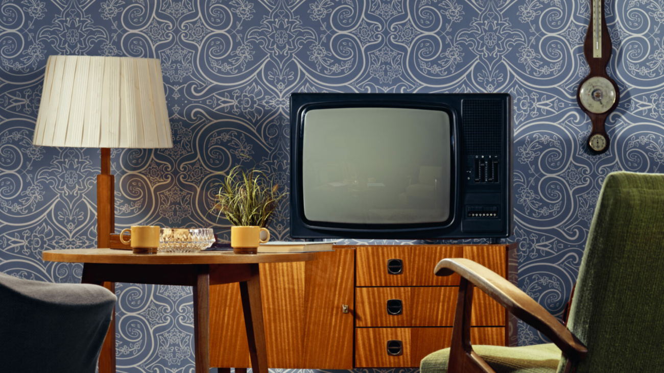 interior-view-of-living-room-with-television-on-cabinet-and-coffee-cups-on-table-stockpack-istock.jpg