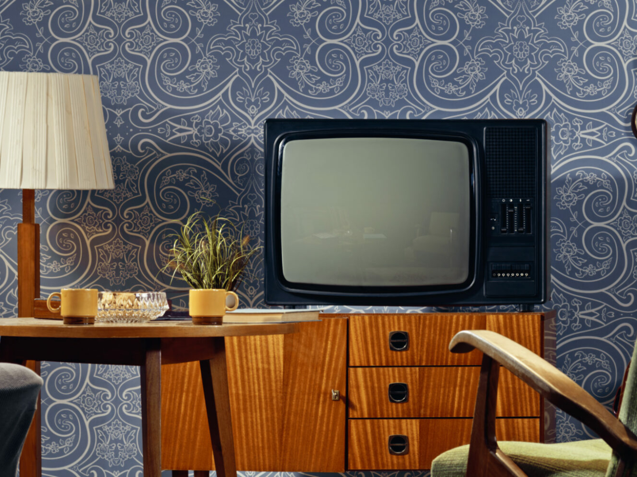 interior-view-of-living-room-with-television-on-cabinet-and-coffee-cups-on-table-stockpack-istock.jpg