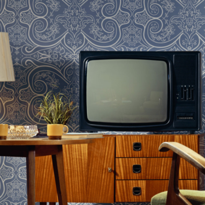 interior-view-of-living-room-with-television-on-cabinet-and-coffee-cups-on-table-stockpack-istock.jpg