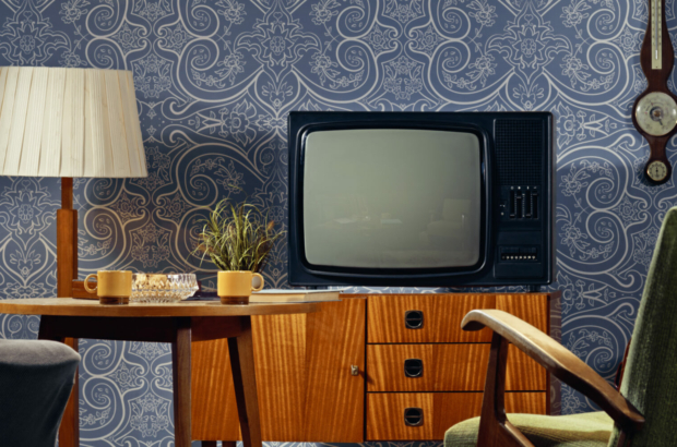 interior-view-of-living-room-with-television-on-cabinet-and-coffee-cups-on-table-stockpack-istock.jpg