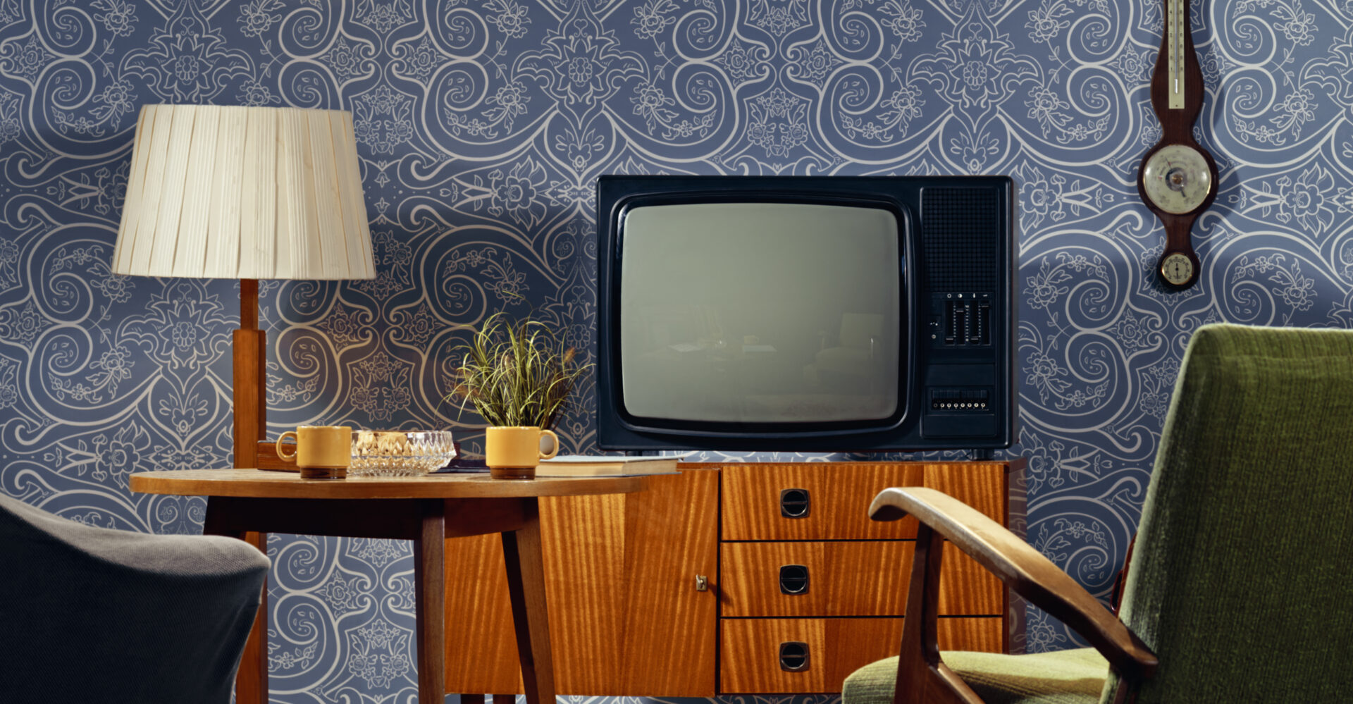 interior-view-of-living-room-with-television-on-cabinet-and-coffee-cups-on-table-stockpack-istock.jpg