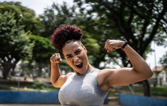 portrait-of-a-young-woman-celebrating-at-a-sports-court-stockpack-istock.jpg