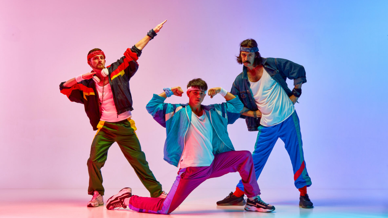 stylish-handsome-three-men-on-old-style-sportswear-training-against-gradient-pink-blue-background-in-neon-light-concept-of-sportive-and-active-lifestyle-humor-retro-style-ad-stockpack-istock.jpg