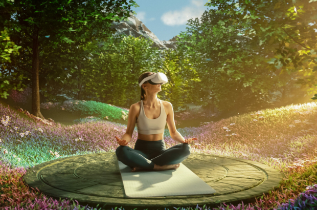 young-athletic-woman-wearing-vr-headset-practising-meditation-in-futuristic-way-her-consciousness-is-transformed-into-beautiful-and-peaceful-forest-wellbeing-and-mindfulness-concept-stockpack-istock.jpg